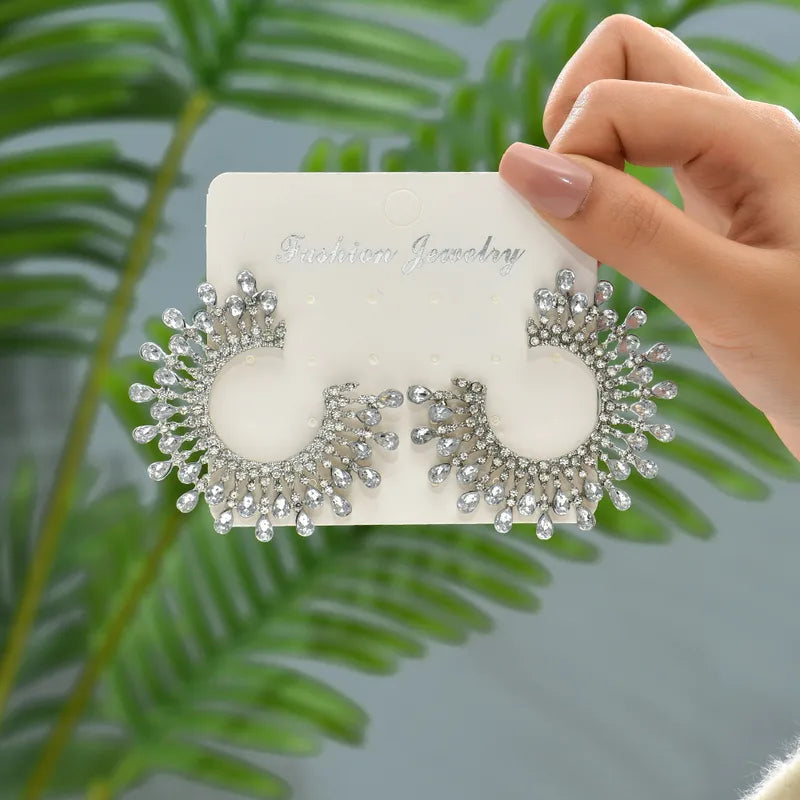 E56 Shiny Round Earrings